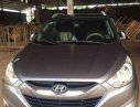 Hyundai Tucson 2011 - Bán ô tô Hyundai Tucson năm sản xuất 2011, màu xám  