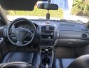 Mazda 323   2001 - Gia đình bán xe Mazda 323 năm 2001, màu trắng, giá chỉ 155 triệu