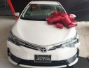 Toyota Corolla altis  1.8E  2019 - Cần bán xe Toyota Corolla Altis 1.8E 2019, màu trắng, 733 triệu