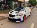 Kia K3  AT 2015 - Cần bán Kia K3 AT năm 2015, màu trắng, xe đẹp