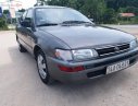 Toyota Corolla 1995 - Cần bán gấp Toyota Corolla sản xuất năm 1995, màu xám