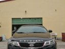 Kia Cerato 1.6 MT 2011 - Bán Kia Cerato 1.6 MT 2011, màu đen, nhập khẩu nguyên chiếc