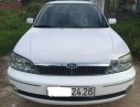 Ford Laser   Ghia 1.8 2002 - Bán xe Ford Laser Ghia 1.8 năm 2002, màu trắng, 168 triệu