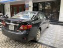 Toyota Corolla altis 2010 - Bán Toyota Corolla Altis đời 2010, màu đen xe gia đình