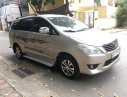 Toyota Innova E 2012 - Cần bán xe Toyota Innova E đời 2012, màu vàng số sàn