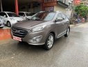 Hyundai Tucson 2011 - Bán ô tô Hyundai Tucson sản xuất năm 2011, màu xám, nhập khẩu nguyên chiếc 