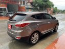 Hyundai Tucson 2011 - Bán ô tô Hyundai Tucson sản xuất năm 2011, màu xám, nhập khẩu nguyên chiếc 