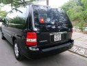 Kia Carnival   2006 - Bán Kia Carnival sản xuất 2006, màu đen, giá tốt