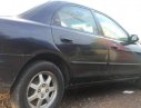 Mazda 323     1998 - Cần bán gấp Mazda 323 sản xuất năm 1998, màu đen, nhập khẩu nguyên chiếc chính chủ, giá chỉ 100 triệu