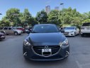 Mazda 2    2016 - Cần bán Mazda 2 Sedan sản xuất 2016, màu xanh lục