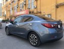 Mazda 2    2016 - Cần bán Mazda 2 Sedan sản xuất 2016, màu xanh lục