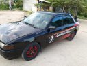 Mazda 323 1996 - Bán Mazda 323 sản xuất năm 1996, màu đen, xe nhập