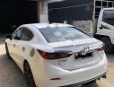 Mazda 3 1.5 2016 - Cần bán gấp Mazda 3 1.5 đời 2016, màu trắng, xe gia đình sử dụng, nữ chạy