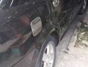 Daewoo Lacetti  MT 2004 - Bán Daewoo Lacetti MT năm sản xuất 2004, màu đen, máy 1.6 ít xăng