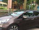 Kia Rio 1.4 AT 2014 - Bán Kia Rio màu nâu, số tự động, đời 2014