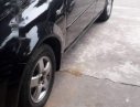 Daewoo Lacetti  MT 2004 - Bán Daewoo Lacetti MT năm sản xuất 2004, màu đen, máy 1.6 ít xăng