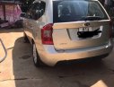 Kia Carens SX 2.0 AT 2010 - Cần bán Kia Carens SX 2.0 AT năm 2010, màu vàng, xe đẹp