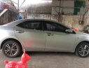 Toyota Corolla altis 1.8G AT 2015 - Cần bán gấp Toyota Corolla altis 1.8G AT 2015, màu bạc giá cạnh tranh