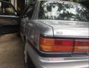 Toyota Camry 1988 - Gia đình bán xe Toyota Camry sản xuất 1988, màu bạc, còn zin