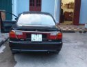 Mazda 323   2000 - Gia đình bán xe Mazda 323 năm 2000, màu đen, nhập khẩu