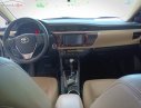 Toyota Corolla altis 1.8G 2015 - Cần bán lại xe Toyota Corolla altis 1.8G đời 2015, màu trắng