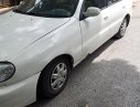 Daewoo Lanos SX 2004 - Bán lại xe Daewoo Lanos SX năm 2004, màu trắng, giá tốt