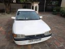 Mazda 323 1996 - Cần bán gấp Mazda 323 1996, màu trắng, nhập khẩu