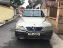 Ssangyong Musso 2.3 MT 2004 - Bán xe Ssangyong Musso 2.3 MT đời 2004, màu vàng giá cạnh tranh