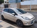 Ford Fiesta 2011 - Bán Ford Fiesta đời 2011, màu vàng cát, 305 triệu