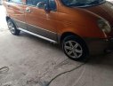 Daewoo Matiz   2005 - Bán xe Daewoo Matiz đời 2005, màu cam