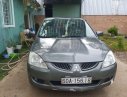 Mitsubishi Lancer   2003 - Bán ô tô Mitsubishi Lancer đời 2003, máy móc còn zin, không đâm đụng, ngập nước