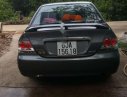 Mitsubishi Lancer   2003 - Bán ô tô Mitsubishi Lancer đời 2003, máy móc còn zin, không đâm đụng, ngập nước