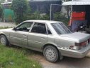 Toyota Camry    2.0   1986 - Cần bán gấp Toyota Camry 2.0 đời 1986, màu bạc, xe đang dùng tốt, nội thất dễ nhìn, hơi trầy