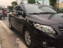 Toyota Corolla altis   2010 - Bán xe Toyota Corolla Altis đời 2010, màu đen, còn rất mới