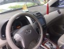 Toyota Corolla altis   2010 - Bán xe Toyota Corolla Altis đời 2010, màu đen, còn rất mới