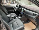 Toyota Corolla altis 1.8G 2015 - Bán Toyota Corolla altis 1.8G đời 2015, màu đen