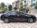 Toyota Corolla altis 1.8G 2015 - Bán Toyota Corolla altis 1.8G đời 2015, màu đen