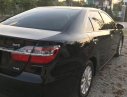 Toyota Camry 2.0E 2015 - Chính chủ bán Toyota Camry 2.0E 2015, màu đen, 810tr