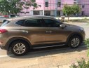 Hyundai Tucson 2.0 2018 - Cần bán gấp Hyundai Tucson 2.0 năm 2018, màu nâu còn mới