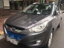 Hyundai Tucson   2010 - Gia đình bán Hyundai Tucson năm sản xuất 2010, màu xám 