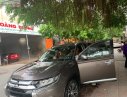 Mitsubishi Outlander 2016 - Bán Mitsubishi Outlander năm sản xuất 2016, màu nâu, xe nhập  