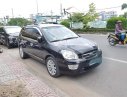 Kia Carens 2010 - Bán Kia Carens sản xuất 2010, màu đen số sàn  