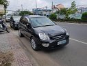 Kia Carens 2010 - Bán Kia Carens sản xuất 2010, màu đen số sàn  