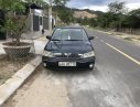 Ford Laser 1.8 2003 - Bán xe Ford Laser 1.8 đời 2003, màu xanh lục, nhập khẩu, đi rất tuyệt