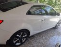 Kia Cerato   Koup 2011 - Cần bán gấp Kia Cerato Koup sản xuất năm 2011, màu trắng, xe thể thao, đèn pha auto