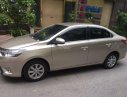 Toyota Vios   E  2014 - Bán Toyota Vios E đời 2014, màu vàng, chính chủ