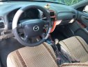 Mazda 626   2003 - Cần bán Mazda 626 sản xuất 2003, màu đen, 152 triệu
