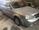 Daewoo Lacetti EX 2009 - Chính chủ bán xe Daewoo Lacetti EX sản xuất năm 2009, màu bạc 