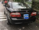 Mazda 626 2001 - Bán ô tô Mazda 626 năm 2001, màu đen còn mới giá tốt 155 triệu đồng