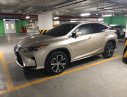 Lexus RX 2016 - Bán xe Lexus RX 200t sản xuất 2016, màu vàng, xe nhập, chính chủ sử dụng